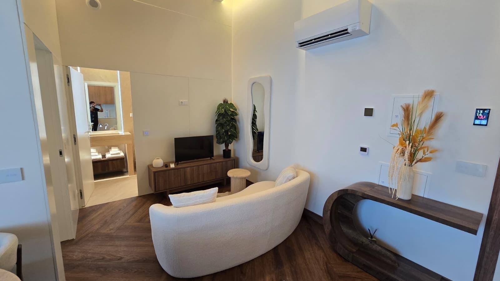 Full-height wardrobes and TV niche